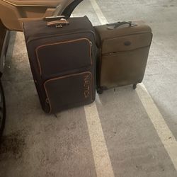 2 Suitcases For 25.00