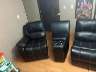 Black leather couches
