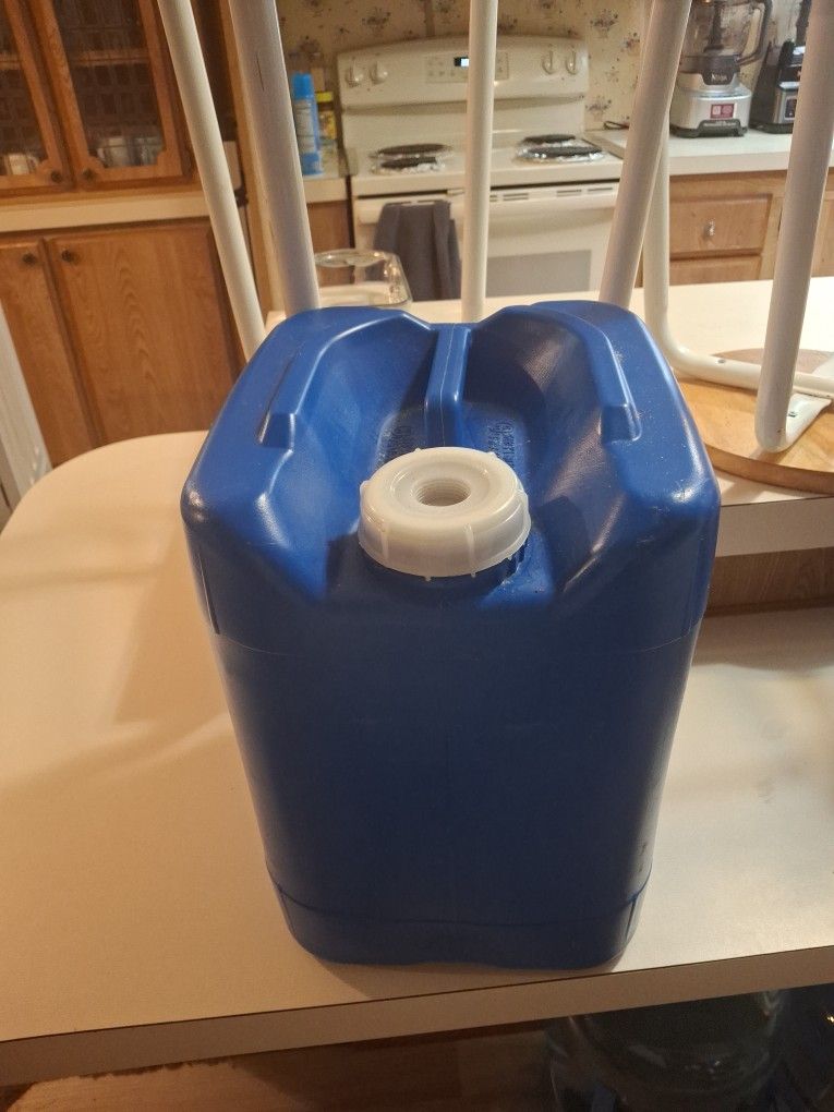 4 Five Gallon Water Jugs