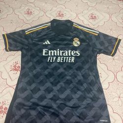 Real Madrid 2023-24 Third Kit Replica (Black/Gold).