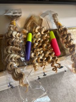 Curly blond hair