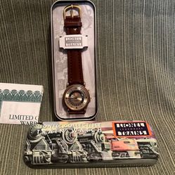 vintage collectible Lionel Train watch. Train spins on the little railroad on the dial of the watch.