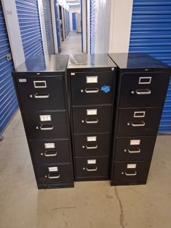 Metal file cabinet  $ 80 each