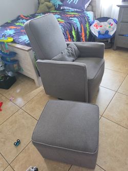 Gray glider chair or rocking chair