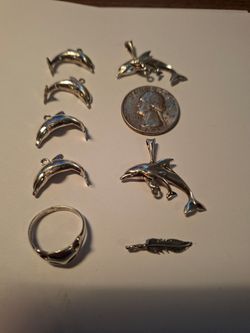 1964 Sterling Silver Dolphins
