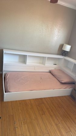 White twin bed frame and mattress. Bed is only three months old. Needed a bigger bed so selling this one.