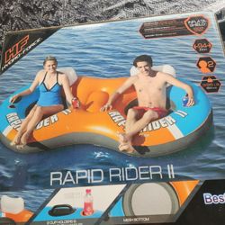 Water Tube Inflatable Ride On. New 