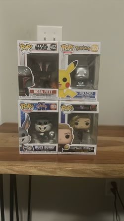 4 Assorted Bobble Heads