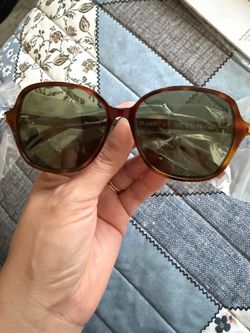 Woman’s Saint Laurent sun glasses