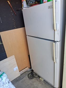Free ! Refrigerator working, storage shed needs to be taken apart and moved.
