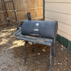 Electric smoker and barbecue pit