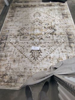 8X10 area rug (new)