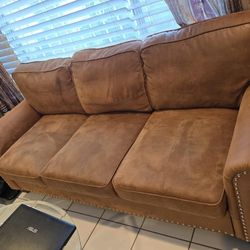 Excellent condition 2 pieces comfortable stylish Faux leather living room set: sofa and loveseat 