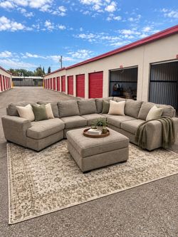 Ashley’s Large Sectional Sofa with Storage Ottoman – $629 – Delivery Available