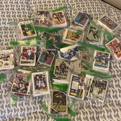 Bag And Stacks Of Rookie Football Baseball Cards And Many Others
