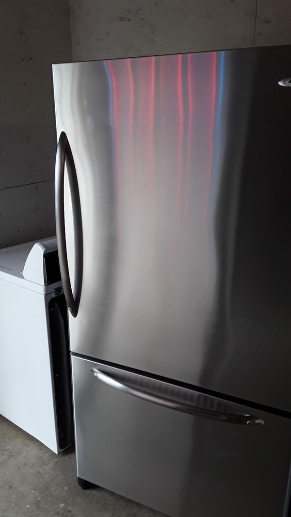 Beautiful 25 cubic foot Amana bottom freezer pull out stainless steel