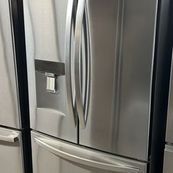 NEW OPEN BOX LG FRENCH STYLE STAINLESS STEEL REFRIGERATOR 