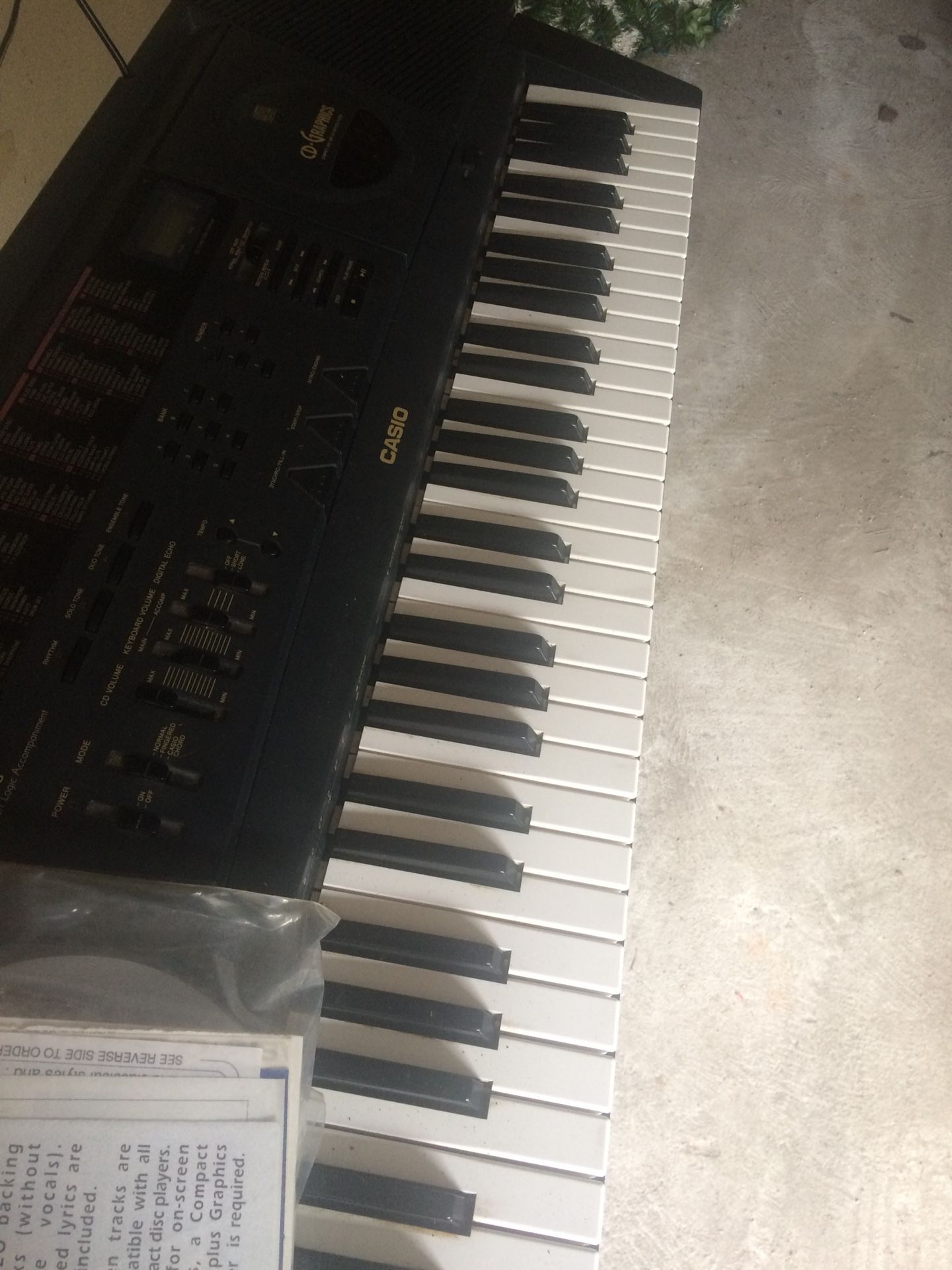 Casio KT 90 G electronic piano with stand.