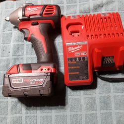 Milwaukee 3/8 Drive Impact Wrench, Complete With M18 Red Lithium XC5. 0 Battery And Charger