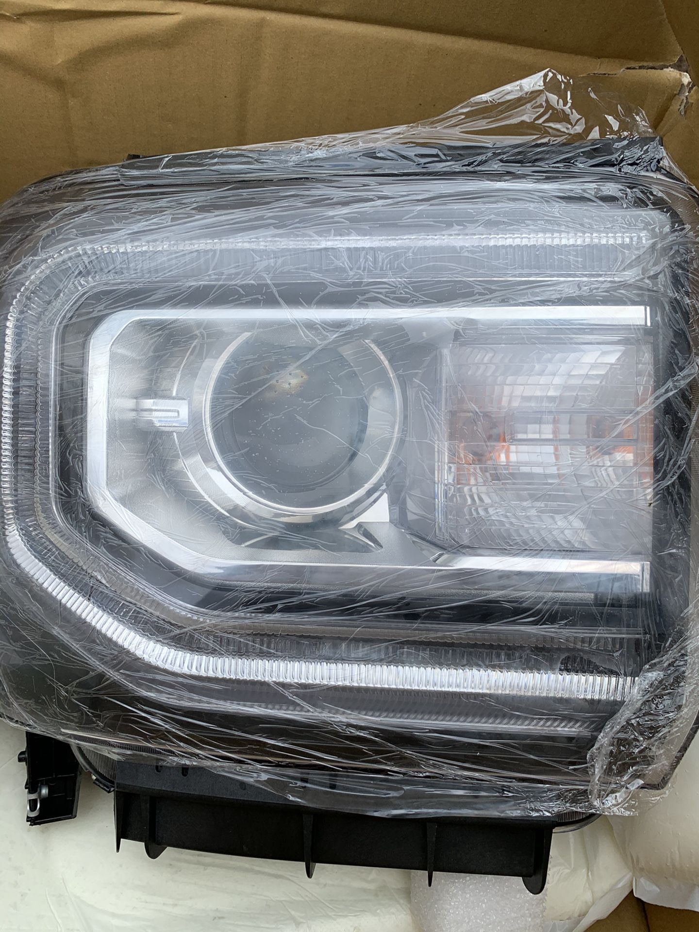 GMC Sierra 1500 headlight replacement
