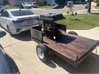 15000kw Westinghouse generator built into 4by 6 trailer. Motorcycle hauler