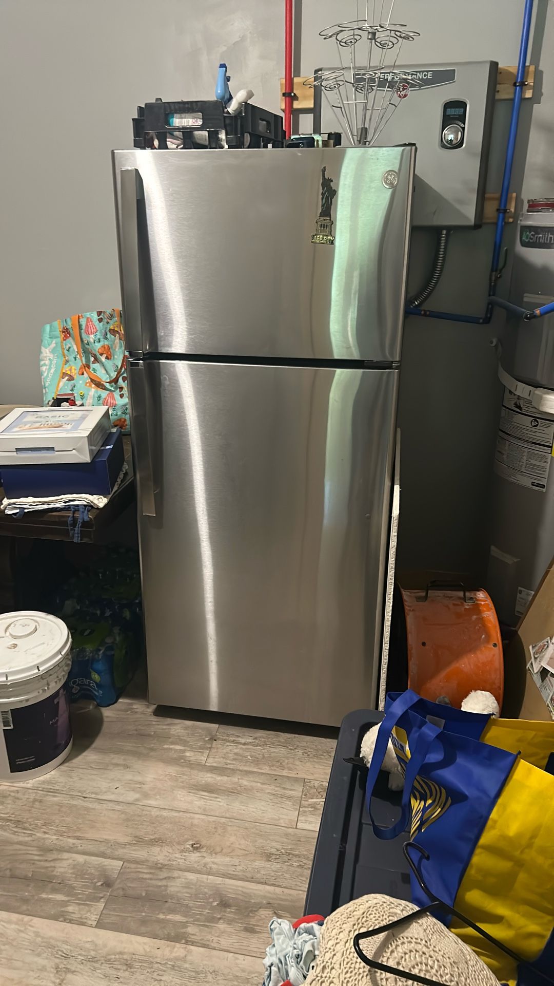Stainless steel refrigerator year a year and a half old works great selling for $250