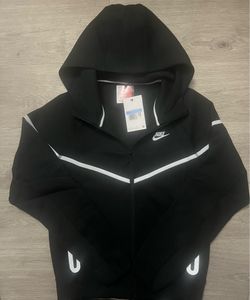 Black reflective Nike tech Size medium available now🏎️📦