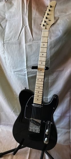 Brand new telecaster electric guitar with new bag and cable