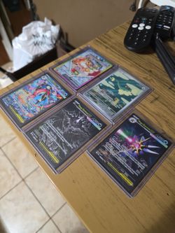 Lot Of 5 pokemon cards pitch black chaos rising perfect order temporal forces prismatic evolutions