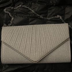 Stylish Silver Metallic Clutch – Like New! 