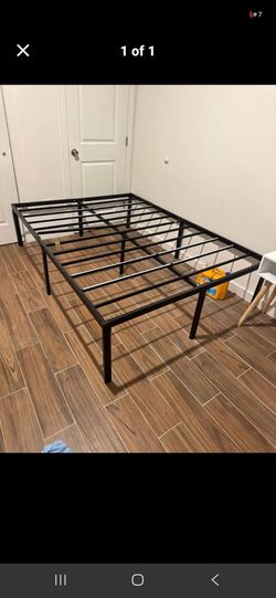 Full size bed frame its still available needs no box spring NE Philly no delivery