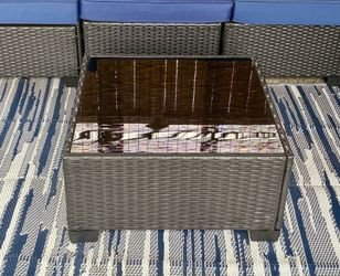 Glass and wicker outdoor table