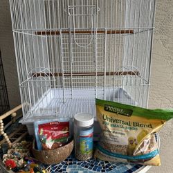 Bord cage plus food, treats and toys