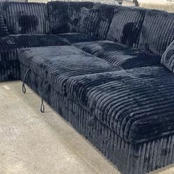 Raha Black Sectional With Pull-Out Bed With Storage. Brand New. 