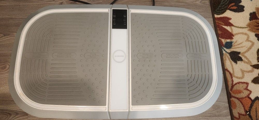 Vibration plate exercise machine like new