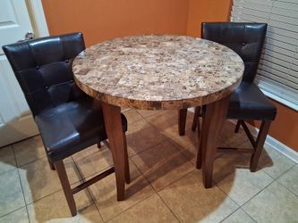 (PURCHASE PENDING) Countertop height table with leather chairs