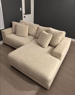 Lindyn Ivory 2 Piece Raf Sectional with Chaise