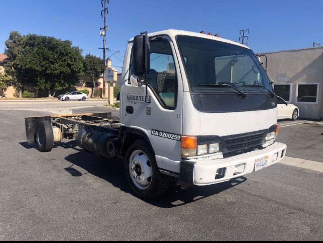 LOW MILES 2002 ISUZU NPR TURBO DIESEL CAB AND CHASSIS TRUCK