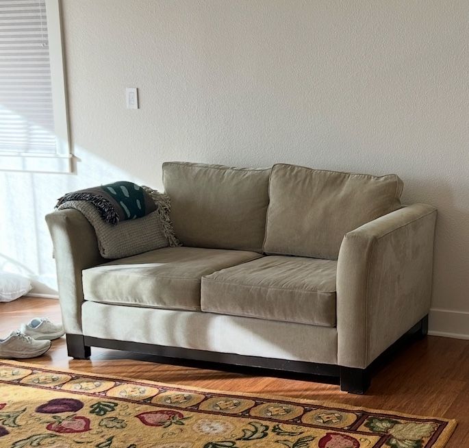 Macy’s light sage colored Loveseat