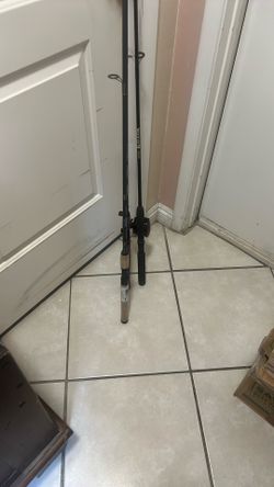 3 Fishing Poles And 1 Reel Bait Caster