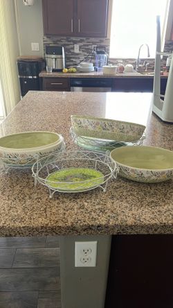 set of 3 ceramic serving bowls in individual white metal/wire holders