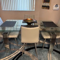 Glass Dining table and 4 chairs 