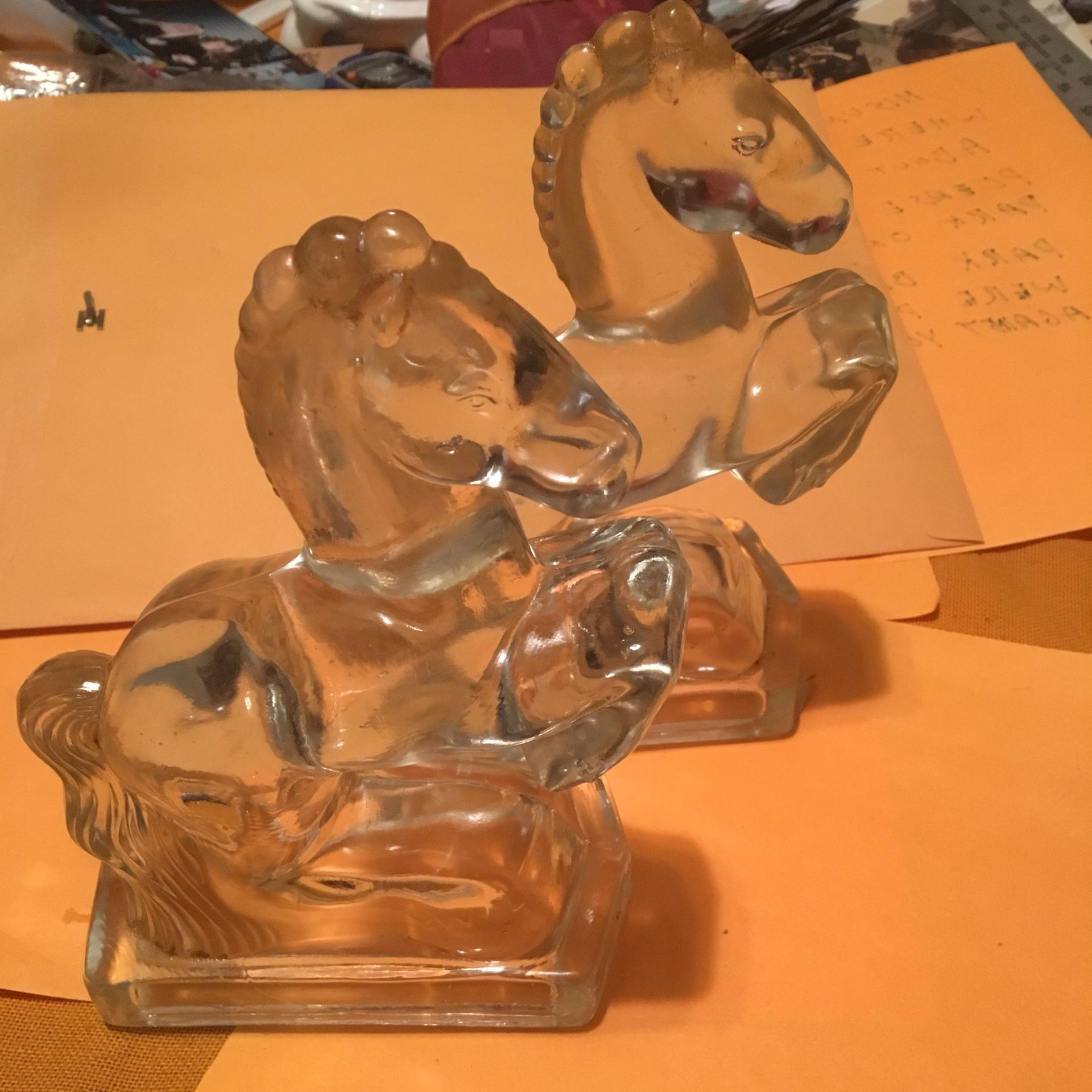 Two heavy glass horse bookends 8” tall