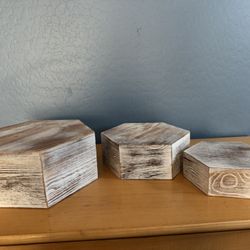 A Set Of Three Display Shelves For Food