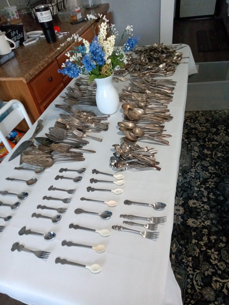 A Table Full Of Great Vintage Silverware & More
