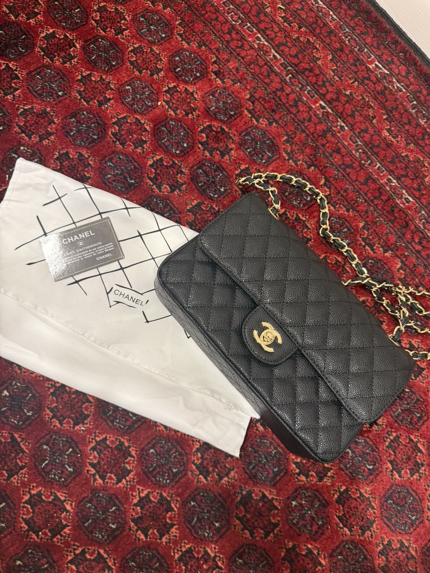 Chanel “Mini Square” Bag