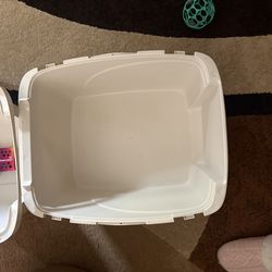 Cream colored cat litter box