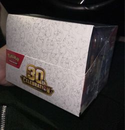 30th sealed tin display