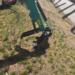 It’s A 2026 Teal Color Mini Excavator 20hr On It 