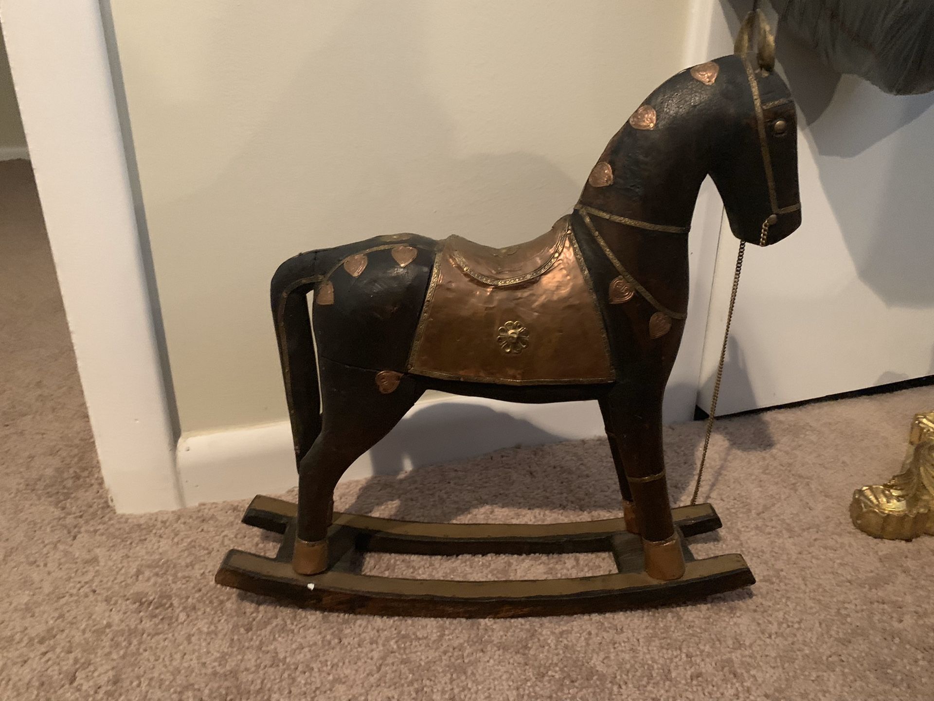 Gold and brown rocking horse